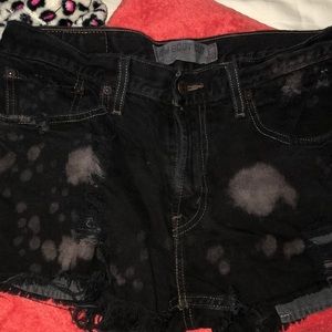 Black Levi distressed shorts